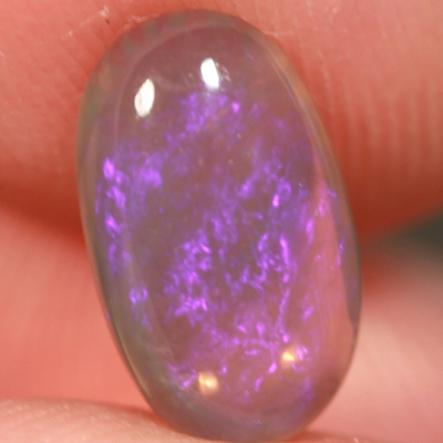 SOLID CRYSTAL OPAL Transparent with sparkles of purple